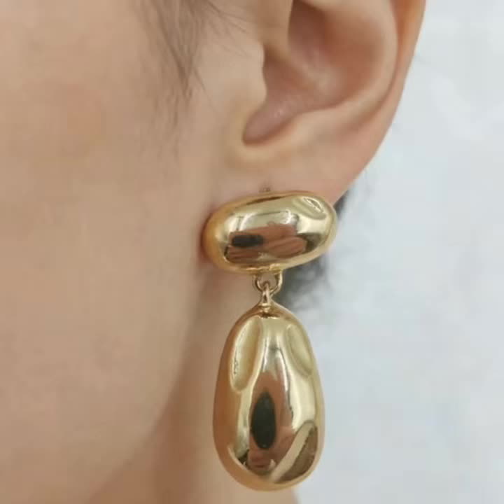 Metal Earrings with Golden Glossy Finish and Teardrop Pendant
